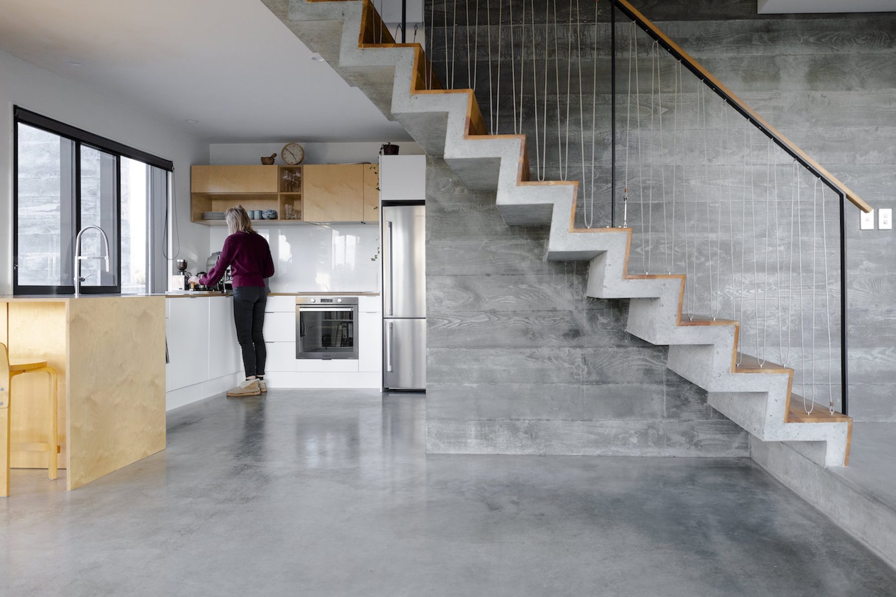 Smith House, concrete cantilevered stair and kitchen